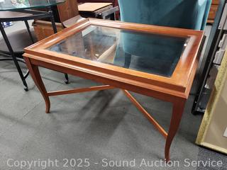Beveled Glass Top Medium Finish Wood Framed Table