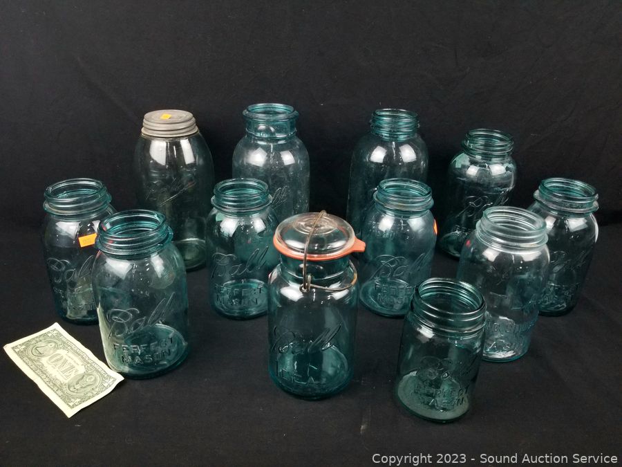 Sold at Auction: 3 Half Gallon Mason Jars with Lids