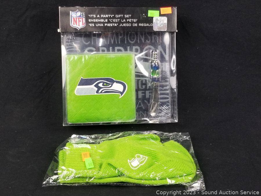 Sound Auction Service - Auction: SAS Allison, Mitchell Online Auction ITEM:  4 Seahawks Shirts, Gift Set & Mittens