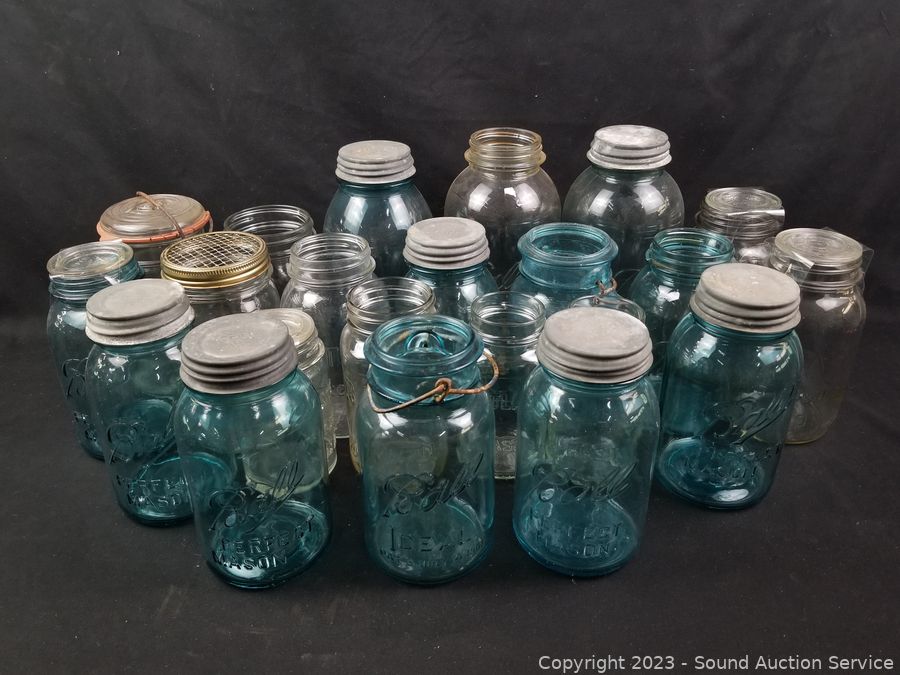 Sold at Auction: 3 Half Gallon Mason Jars with Lids