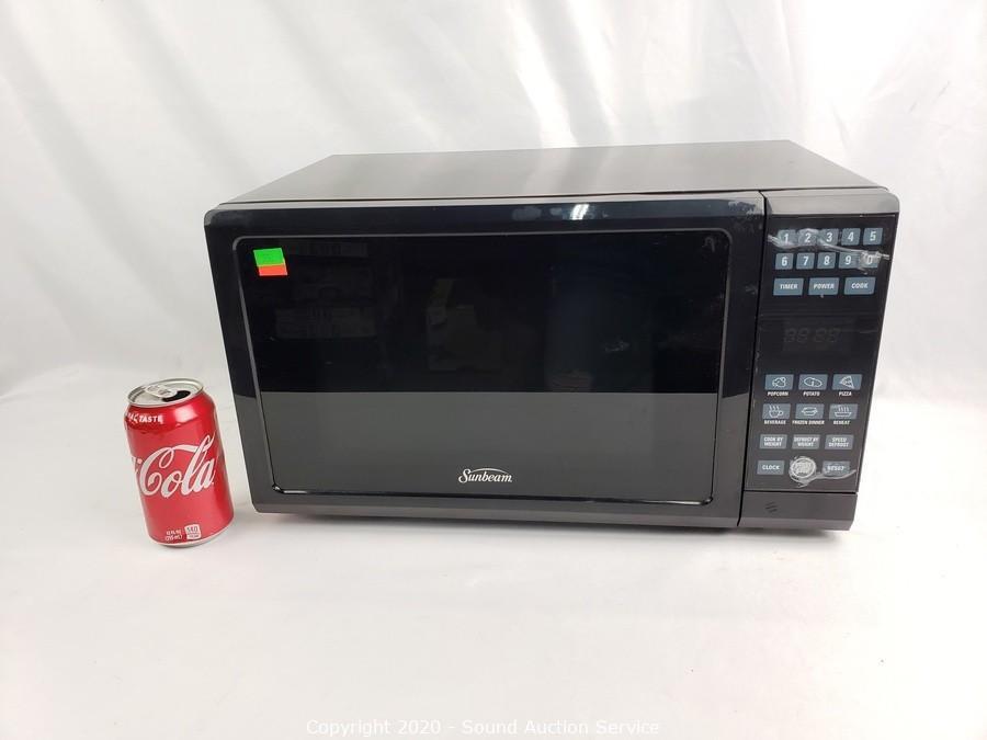 Sold at Auction: Sunbeam Small Counter Microwave