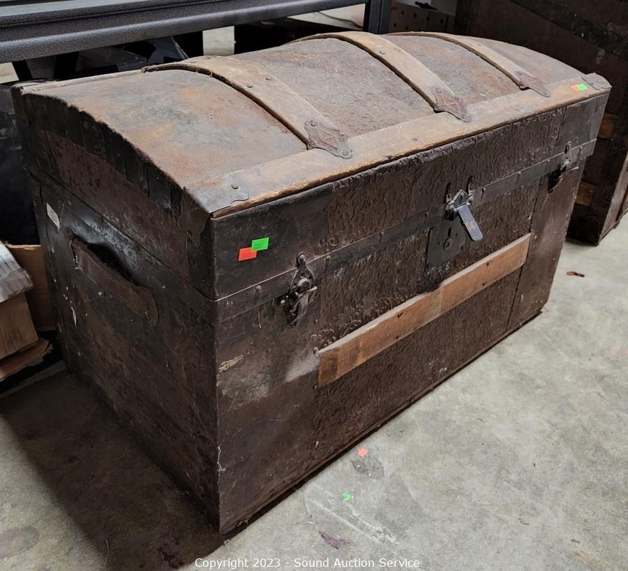 Sold at Auction: Wooden And Metal Humpback Trunk