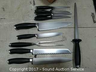 Sold at Auction: Calphalon Knives, Carving Knife & Forks