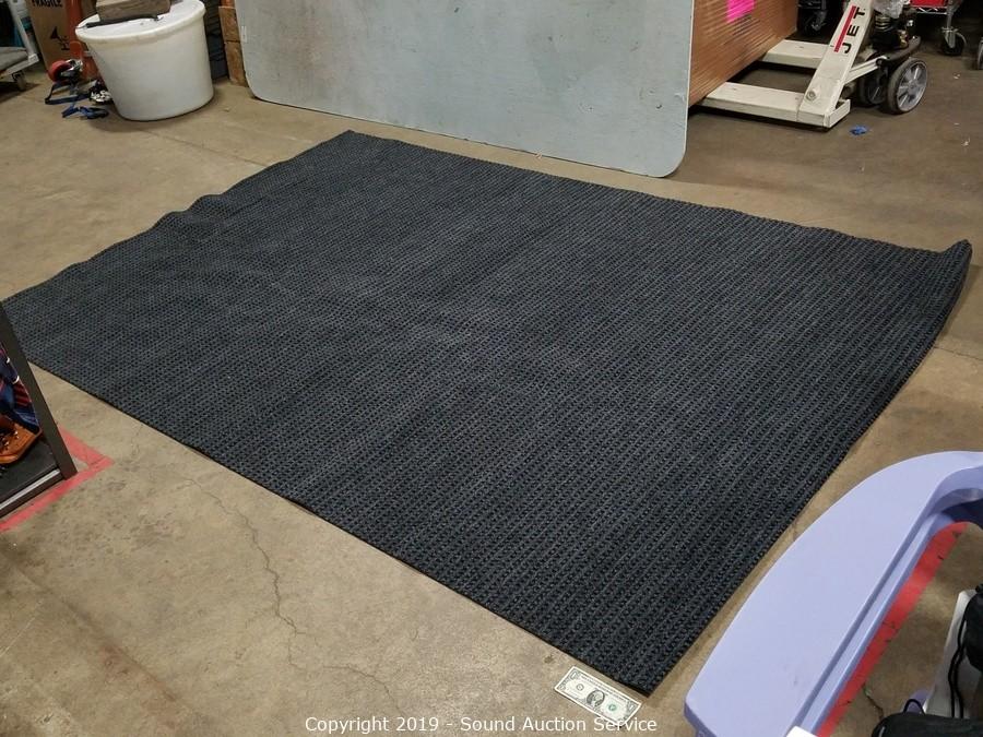 Sold at Auction: GARAGE RUG