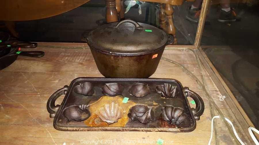 Sold at Auction: Cast Iron Muffin Pan